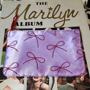 PURPLE SATIN COSMETIC BAG with RED RHINESTONE BOW DESIGN